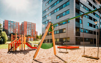 Fototapeta na wymiar EU Children playground equipment in residential house quarter Baltupiai Vilnius