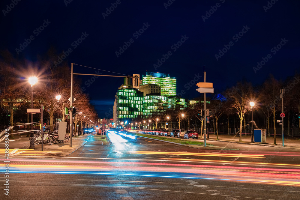 Wall mural road with modern architecture on potsdamer platz night