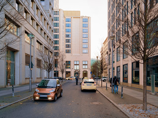 Street with cars and modern architecture in Potsdamer Platz