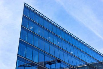 Fototapeta na wymiar Modern Blue glass house and business building architecture Berlin