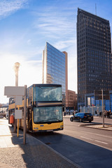 Bus on road and modern building architecture in Potsdamer Platz