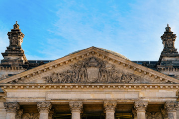 Obraz premium Facade of Reichstag building architecture with German Flags in Berlin