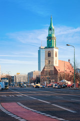 Cityscape view with road in Berlin and St Mary Church