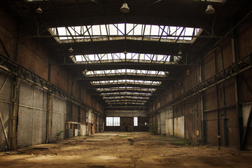 Abandoned empty old factory workshop interior