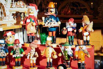 Wooden Christmas toys and decorations in Christmas market in Alexanderplatz - obrazy, fototapety, plakaty