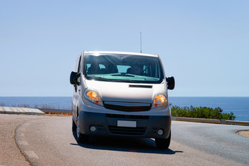 Fototapeta na wymiar Mini van in Road in Villasimius in Cagliari in Sardinia