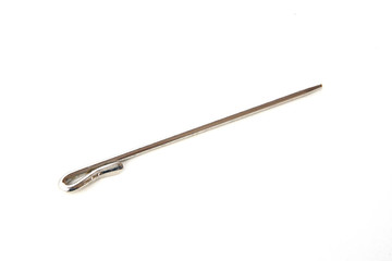 Needle like metal object isolated on white background. This can be used for sewing as well as tidying hair for Sikh boys and men.