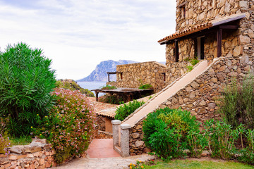 Cottage at Capo Coda Cavallo at Mediterranean sea