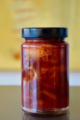 jar of delicious coarse home made plum jam