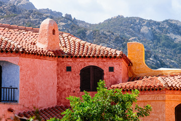 Windows and roof of residential house complex in Porto Cervo