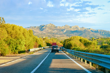 Cars at road in in Sardinia Island