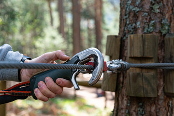 Male fastening hook for secure extreme adventure on high wire