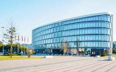 Modern commercial architecture of modern glass and steel forum skyscraper