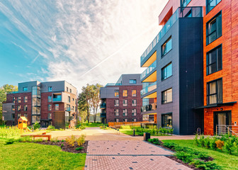 Benches at Modern european complex of apartment buildings