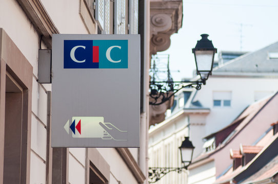 Colmar - France - 24 August 2019 - Closeup of CIC logo on board on agency bank in the street