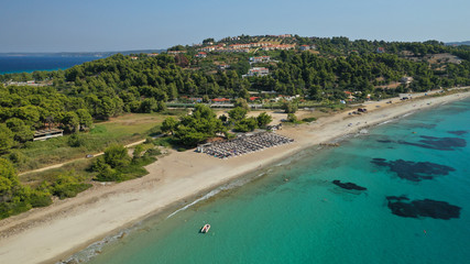 Aerial drone photo of iconic exotic sandy peninsula and sandy beach of Possidi with turquoise clear sea, Kassandra, Halkidiki, North Greece