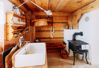 Obraz na płótnie Canvas Modern design of Home wooden Kitchen Interior sink and oven