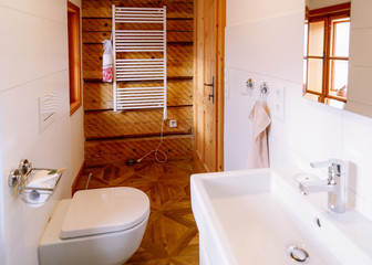 Interior with modern bathroom wood design toilet bowl sink mirror