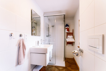 Interior with modern white bathroom with wood design sink shower