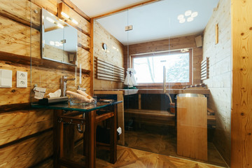 Interior modern bathroom with wood design sauna