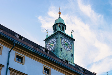 Fototapeta na wymiar Clock tower of Styrian Armoury in Graz