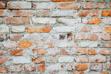Urban brick wall cracked as background isolated