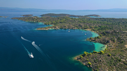 Aerial drone panoramic photo of iconic exotic bay known as blue lagoon in Diaporos island with...