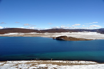 blue lake with snow (Lake Khovsgol, Mongolia - Siberia)