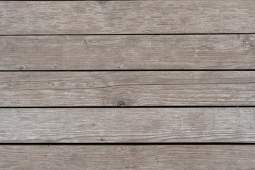 Old grey barn wall wood background texture close up