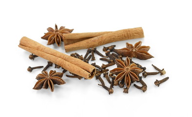 Cinnamon sticks, cloves and anise star isolated on white background close up. Spice Cinnamon sticks dried cloves and anise star.