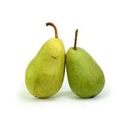 Green organic pears on white background