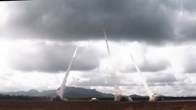 Participants from the U.S. Army, U.S. Marines, and Australian Defense Force, showcase a live fire of the M142 High Mobility Artillery Rocket System (HIMARS), 2019