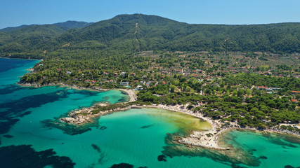 Aerial drone photo of iconic turquoise paradise sandy twin beaches of Karidi in Sithonia Peninsula, Vourvourou bay, Halkidiki, North Greece