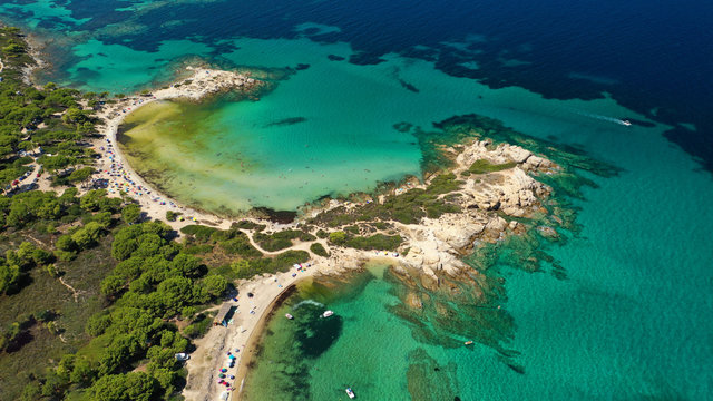 Aerial drone photo of iconic turquoise paradise sandy twin beaches of Karidi in Sithonia Peninsula, Vourvourou bay, Halkidiki, North Greece © aerial-drone