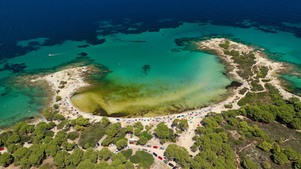 Aerial drone photo of iconic turquoise paradise sandy twin beaches of Karidi in Sithonia Peninsula, Vourvourou bay, Halkidiki, North Greece