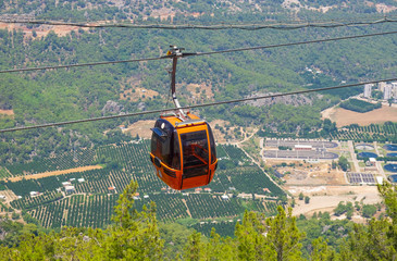View  on the cable car with orange cable car in Antalya, Turkey.
