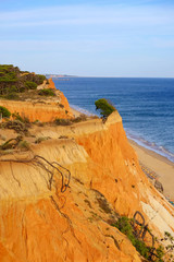 Aerial view on the beach Praia da Falesia Barranco das Belharucas. Region Faro, Algarve, Portugal.