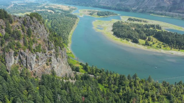 Beacon Rock, an 848-foot (258 m) basalt volcanic plug on the north shore of the Columbia River 32 miles (51 km) east of Vancouver. It was named by Lewis and Clark in 1805.  