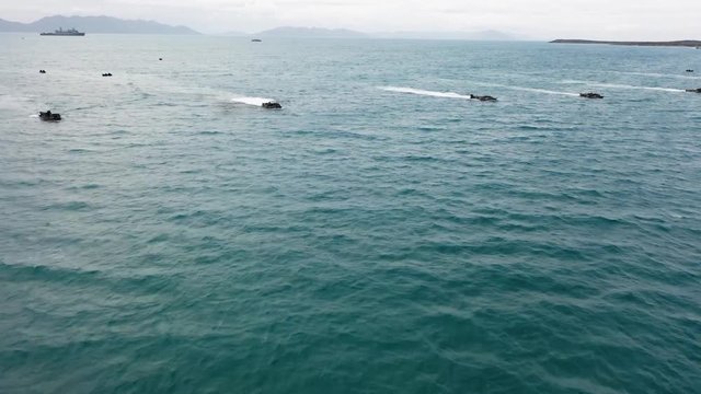 Forces from the United States, Australia, United Kingdom, and Japan commence an amphibious beach assault exercise at King's Beach in Bowen, Queensland, July 22, 2019