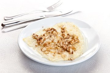honey with cream and walnut platter on white background