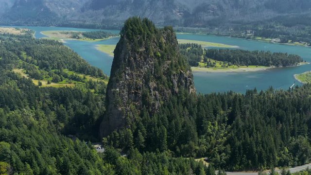 Beacon Rock, an 848-foot (258 m) basalt volcanic plug on the north shore of the Columbia River 32 miles (51 km) east of Vancouver. It was named by Lewis and Clark in 1805.  