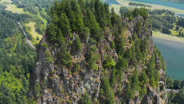 Beacon Rock, an 848-foot (258 m) basalt volcanic plug on the north shore of the Columbia River 32 miles (51 km) east of Vancouver. It was named by Lewis and Clark in 1805.  