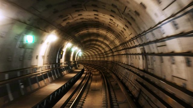 Copenhagen, Denmark. Riding the metro in Copenhagen, Denmark with motion blurred tube lines in tunnel