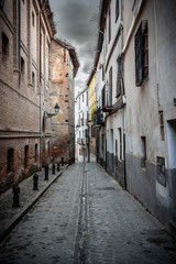 Fototapeta na wymiar details of street in albaicin, granada, view of a narrow street in albaicin, the arab quarter in granada. spain