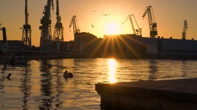 Image of Pula Harbour during scenic sunset, Croatia.