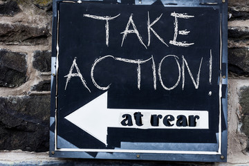 Word writing text Take Action. Business photo showcasing do something official or concerted to achieve aim with problem Advertisement concept with empty copy space on the road sign