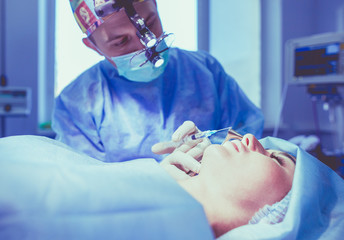 Man surgeon at work in operating room