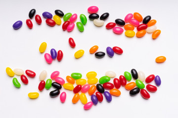 colorful jelly beans candies white background Top view
