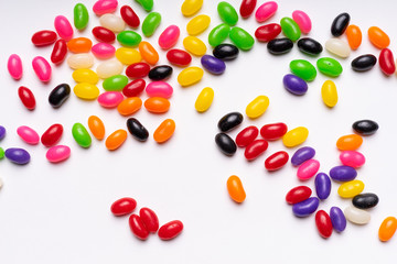 colorful jelly beans candies white background Top view