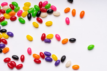 colorful jelly beans candies white background Top view